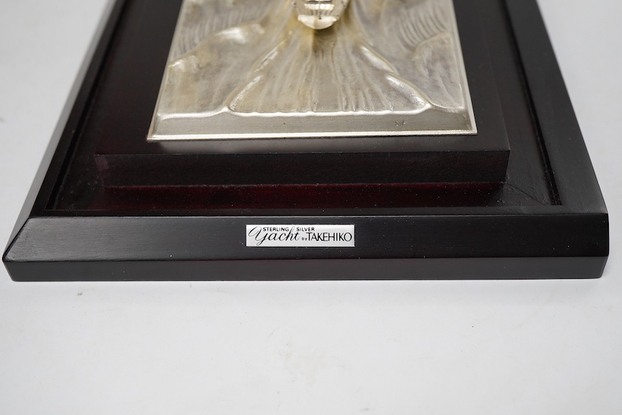 A modern sterling miniature model of 'Yacht No.6 Cutter' by Takehiko, in a presentation case, fixed on a wooden base, yacht dimensions approximately height 13.4cm, length 15cm, with box and pamphlet.